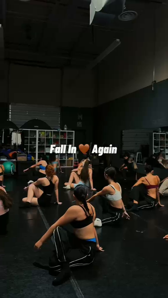 Dancers rehearsing a floorwork sequence together